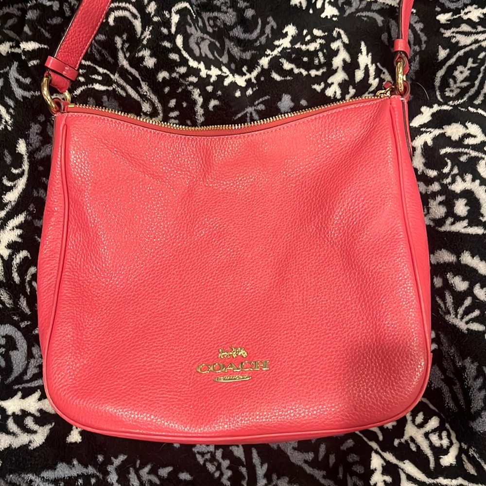 Coach raspberry pink colored crossbody purse